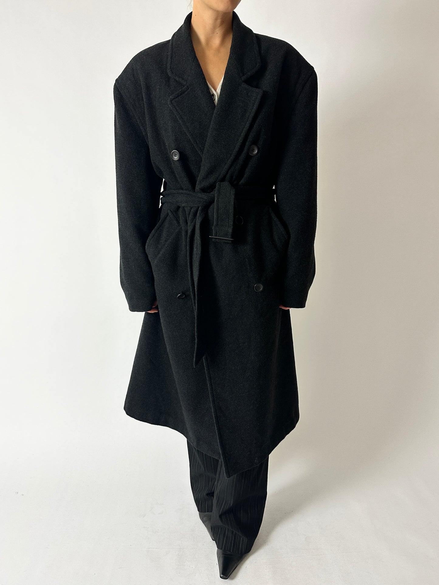 Vintage long wool belted coat in anthracite. A coat vintage timeless piece with oversized silhouette. Curated by NYN