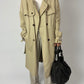Long classic trenchcoat curated vintage coat made of soft cotton blend in a butter beige color, timeless wardrobe staple