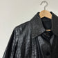 Croc-embossed leather coat | Black