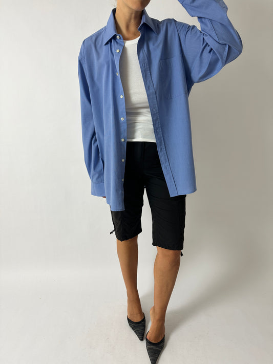 Vintage blue oversized shirt with black capri pants and pointy heeled mules