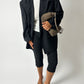 Capri stretch trousers | Black