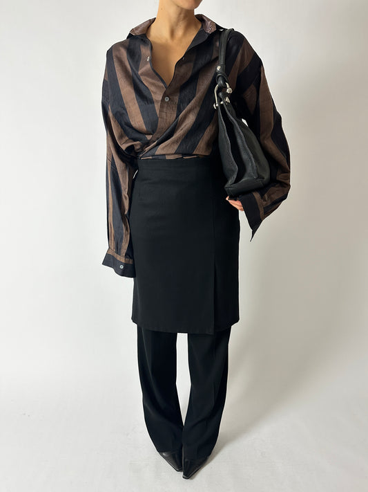 Wool pencil skirt in black, a curated vintage pieces with full lining and  worn with a vintage striped silk blouse in black and brown