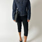 Vintage denim jacket in dark blue worn with a black capri and heeled mules. Curated by NYN