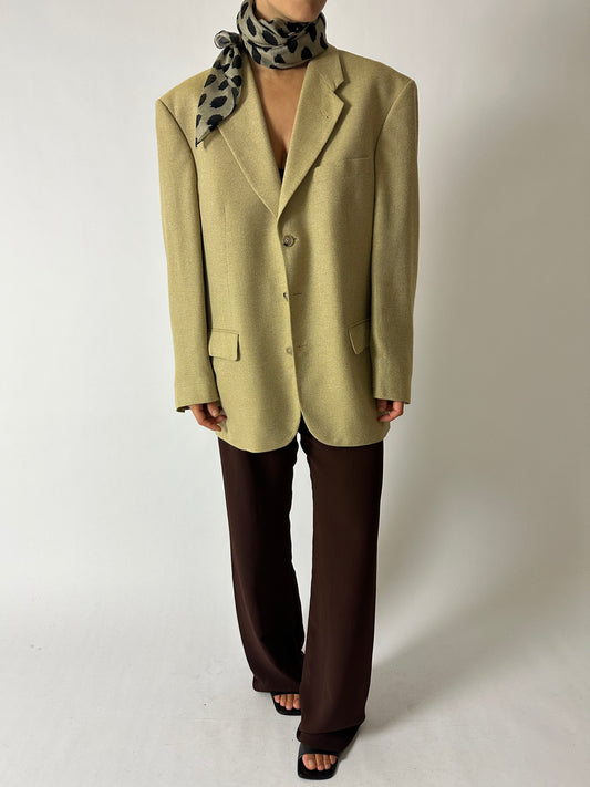 Vintage oversized woven blazer in dark butter hue. A timeless staple piece for everyday wear. Curated by NYN