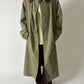 Vintage long Mac coat with detachable leather collar in soft green. A unique vintage piece in outstanding condition. Curated by NYN