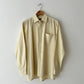 Vintage cotton shirt in a butter hue. A classic versatile piece for everyday wear. Curated by NYN