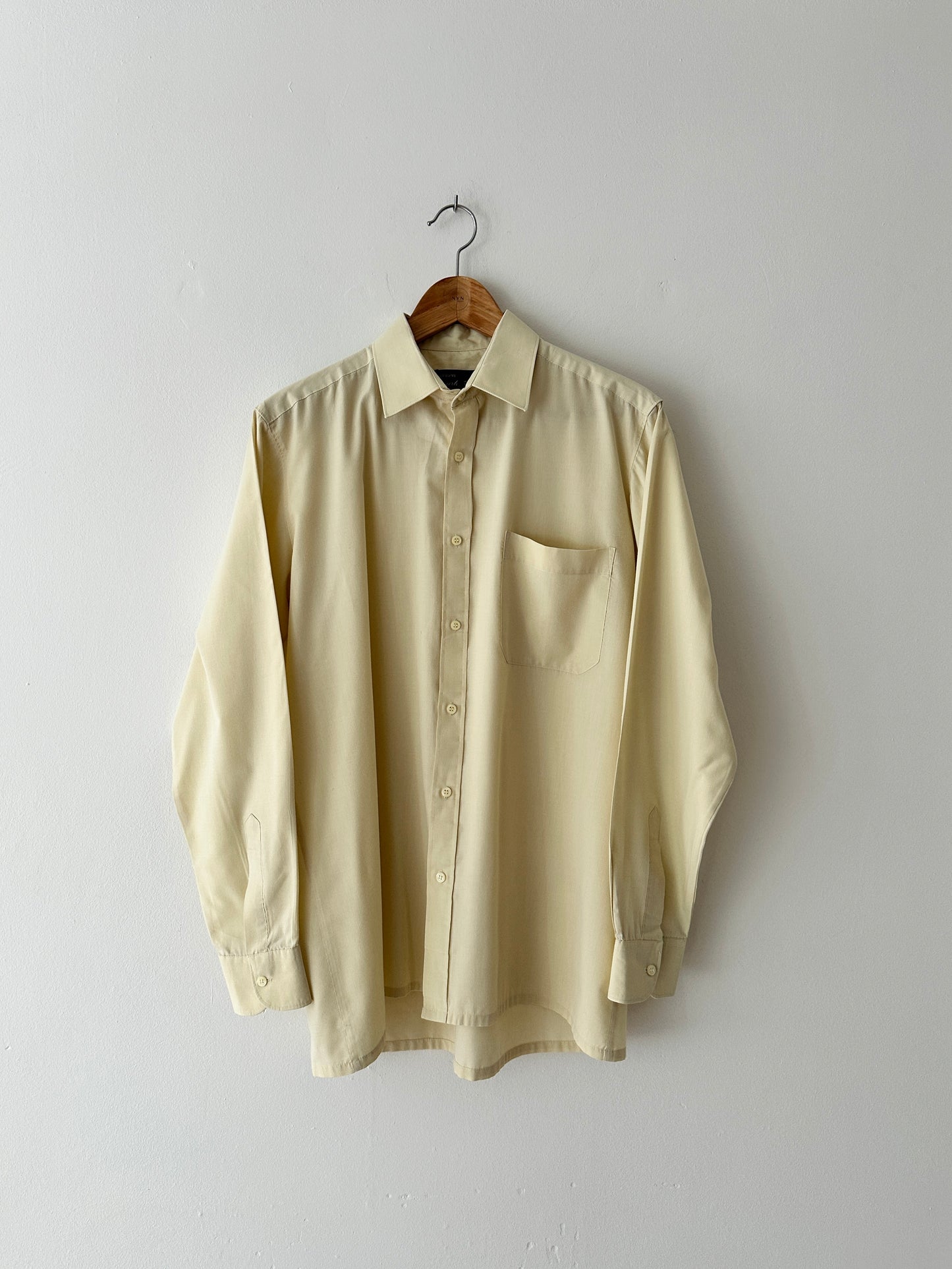 Vintage cotton shirt in a butter hue. A classic versatile piece for everyday wear. Curated by NYN