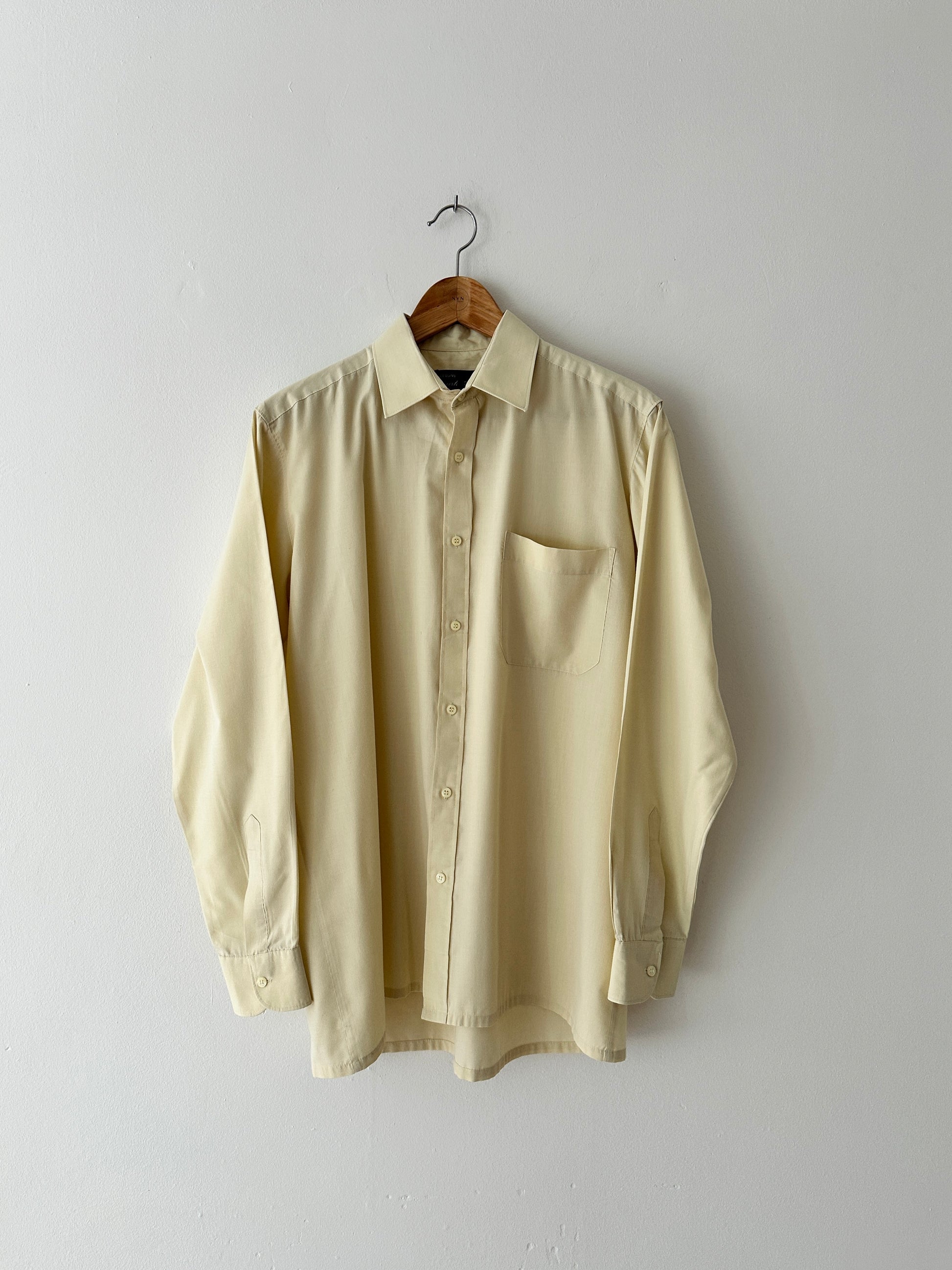 Vintage cotton shirt in a butter hue. A classic versatile piece for everyday wear. Curated by NYN