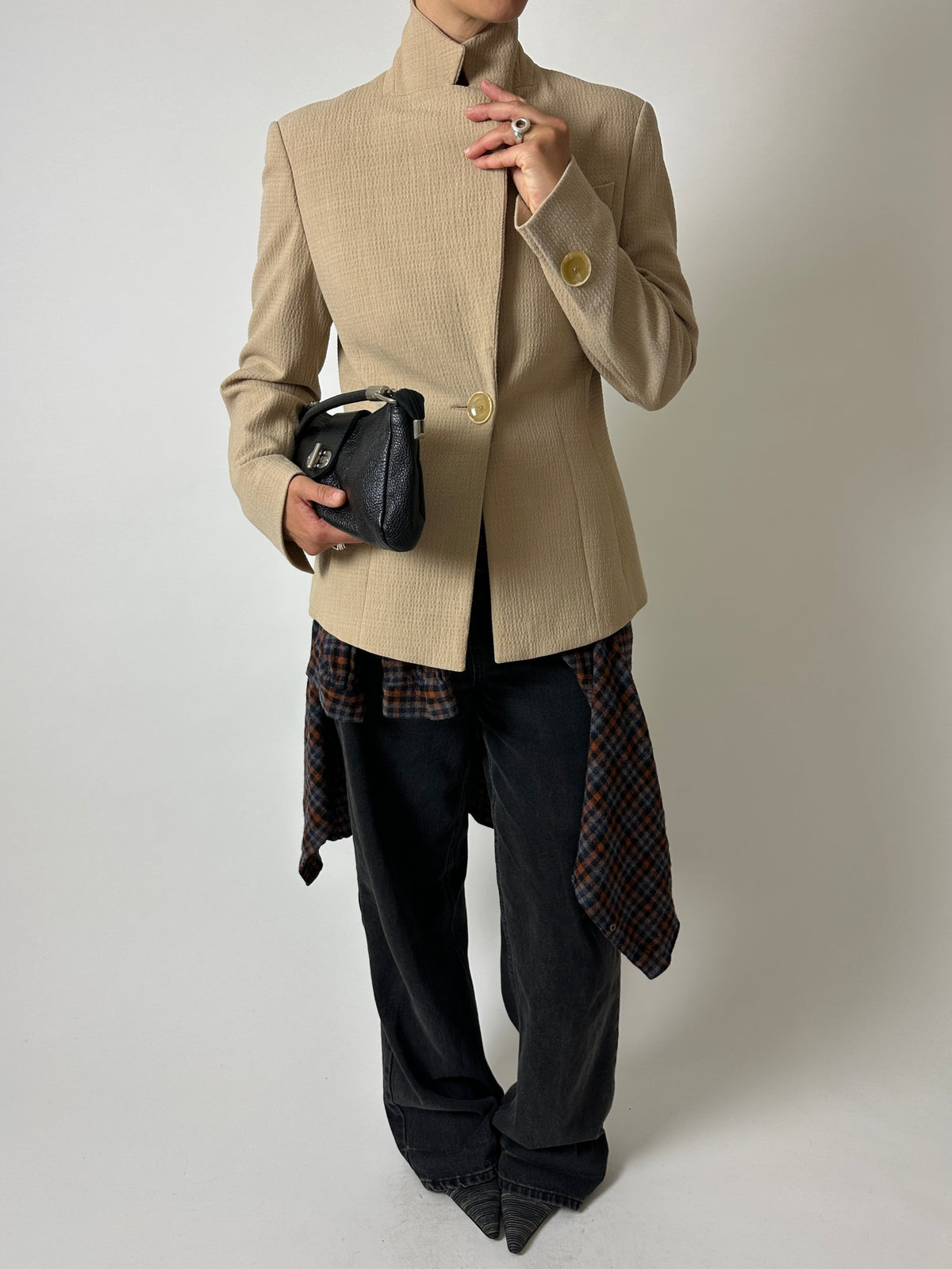 Vintage fitted blazer wool blend in soft beige worn with a checked vintage shirt in black and brown.